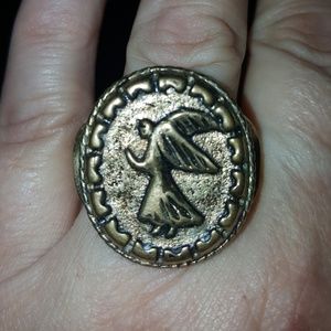 Bronzed ring with angel